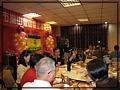 2010-12-18 下午 06-58-09邊吃邊開會.JPG